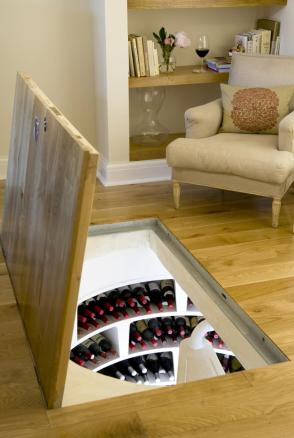 Veiniaustaja põranda alla peidetud kelder, nii on võimalik ruumisäästev kelder oma majja luua. Source: www.komonews.com