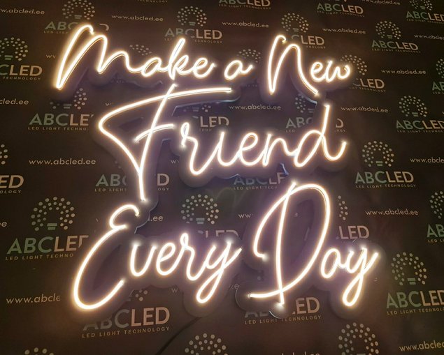 Reklaami taustvalgustus tehtud painduvast neoon led ribast.